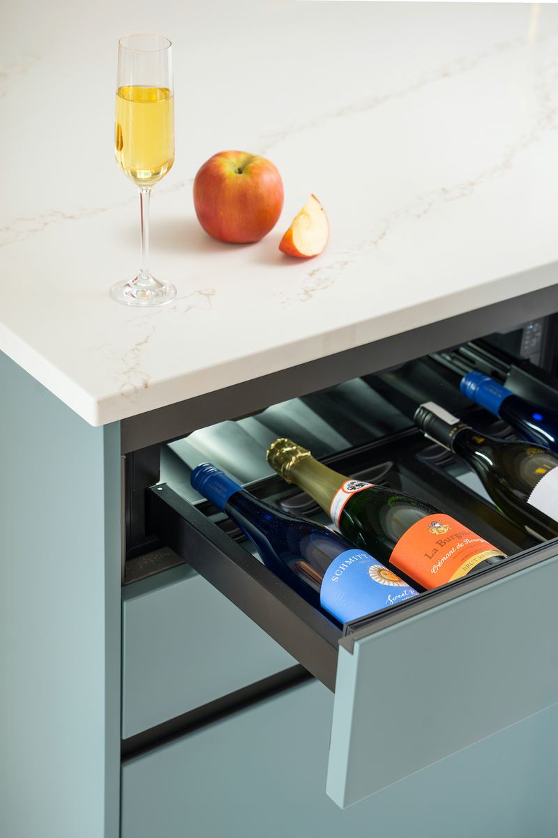 Wine drawer in a Zecchinon island under a quartz worktop